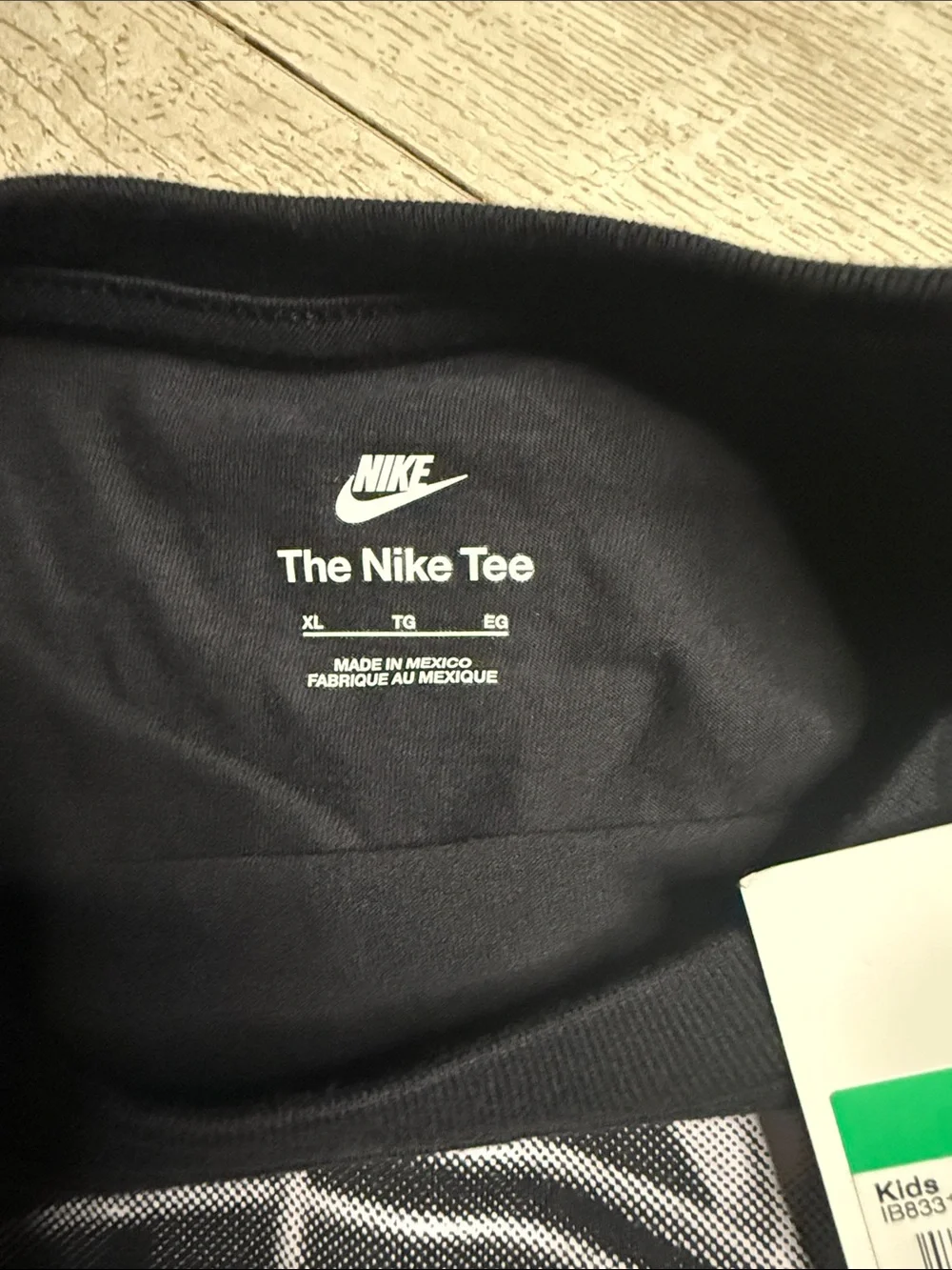 Nike Black Graphic 'Play Attention' Tee with White Print and Purple Logo
